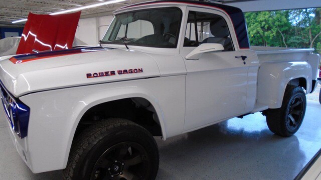 White Dodge Power Wagon pickup truck.