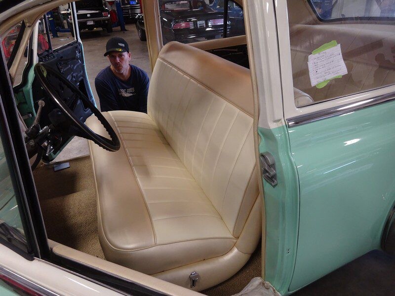 Classic car's interior, cream leather seats.