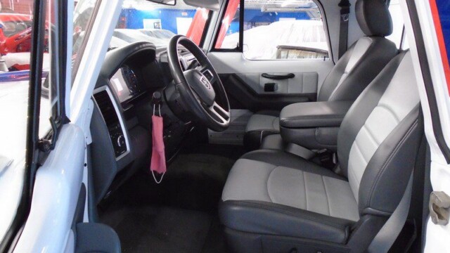 Gray and white truck interior seats.