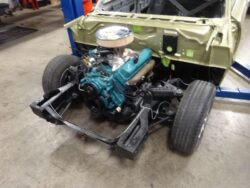 Classic car engine restoration in progress.