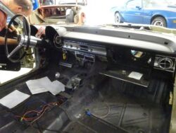 Classic dash with exposed wiring and shifter
