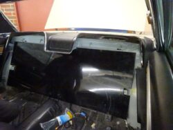 Classic car interior panel installation.