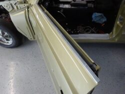 Beige classic car door open showing sill