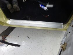 Car door sill plate installation.