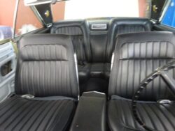 Vintage convertible black leather seats and console