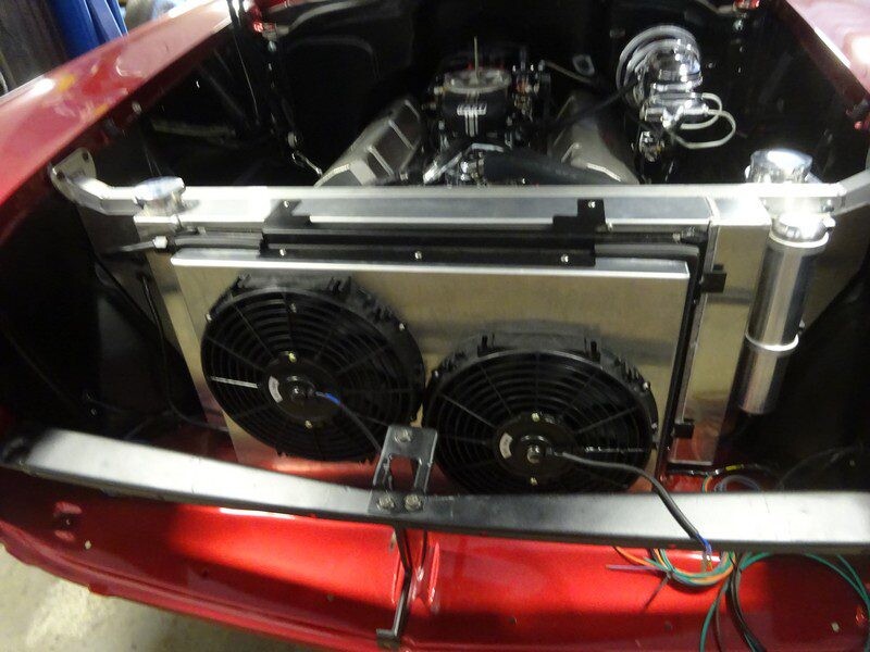 Custom car engine with dual fans.