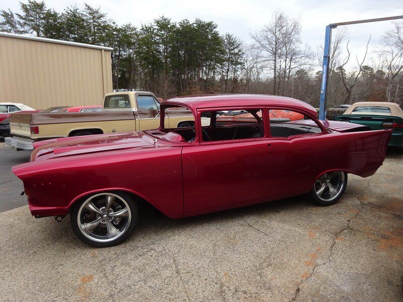 Red 1955 Chevrolet custom car.