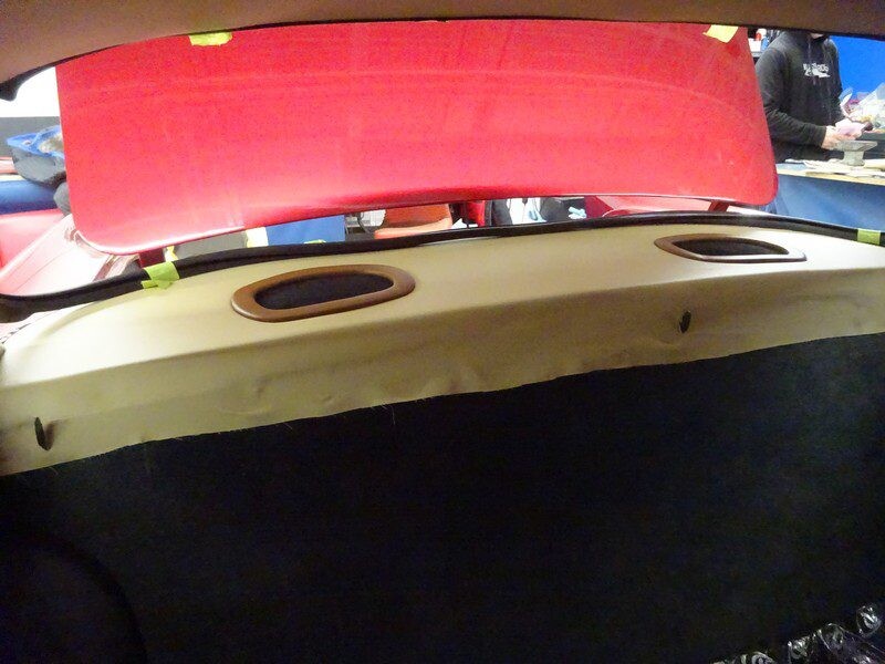 Car's rear parcel shelf installation.