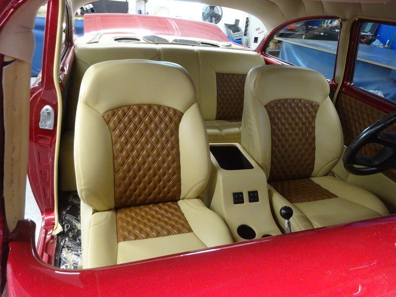 Custom car interior, tan and brown seats.