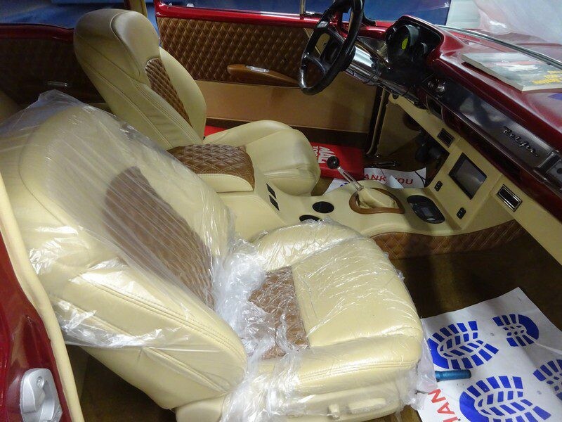 Custom car interior, tan and brown leather.