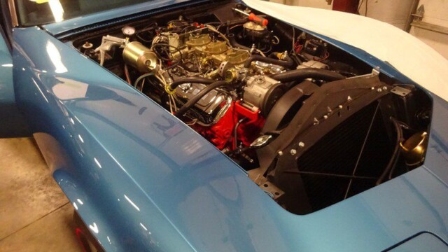 Blue Corvette engine bay detail.