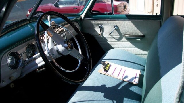 Vintage car interior, teal and light blue.
