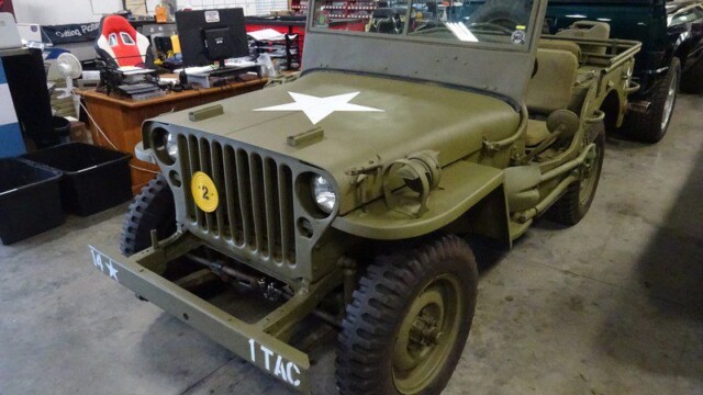Vintage military Jeep, olive drab.