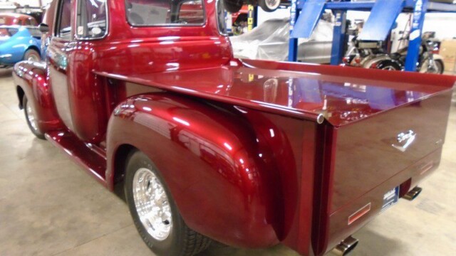 Red classic pickup truck restoration.