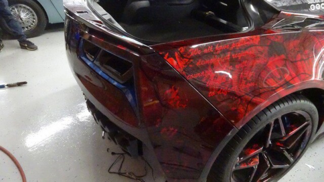 Red Corvette rear, custom paint job.