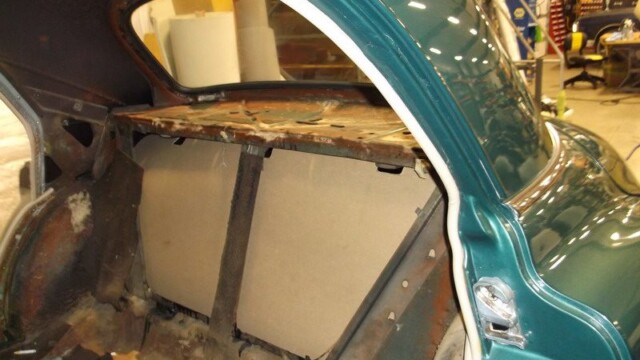 Classic car rear seat restoration in progress.