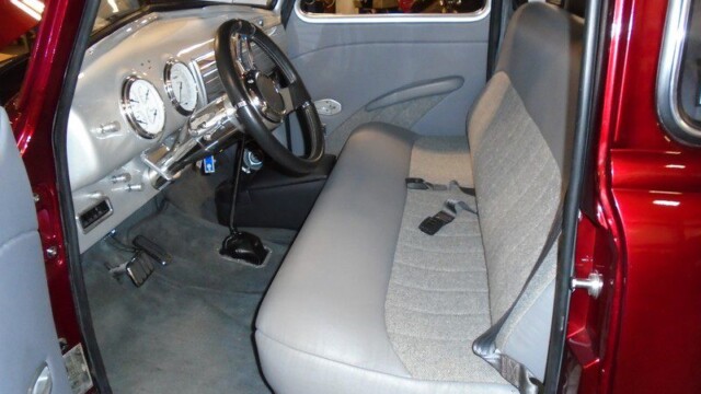 Red classic car interior, custom seats.