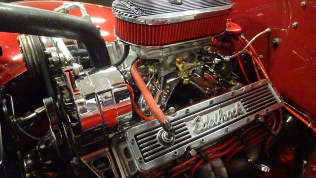 Edelbrock engine in a red car.