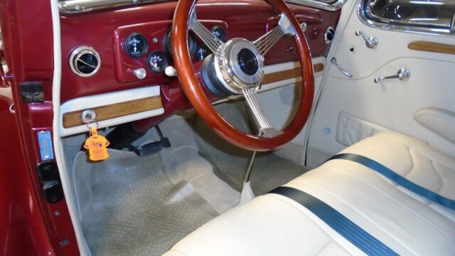 Classic car interior, red and cream.
