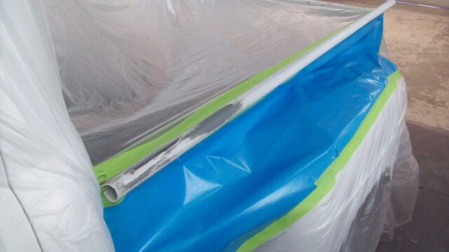 Truck bed masked for paint job.