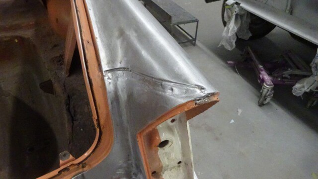Car body repair, metalwork in progress.