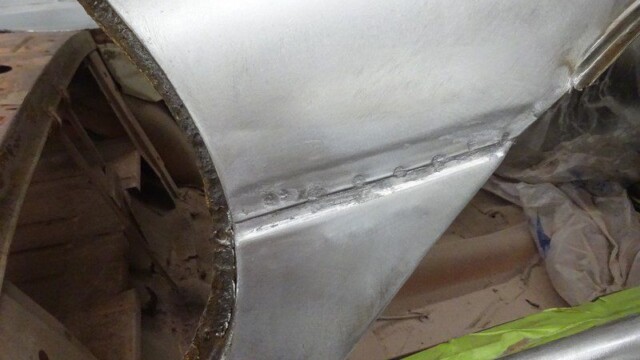 Wheel arch patch with stitch welds