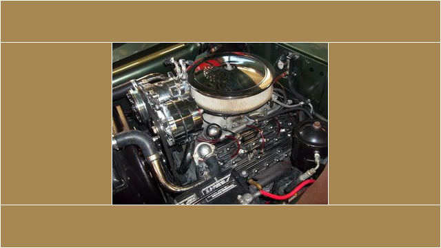 Here's an alt tag for the image: Custom-built car engine close-up.