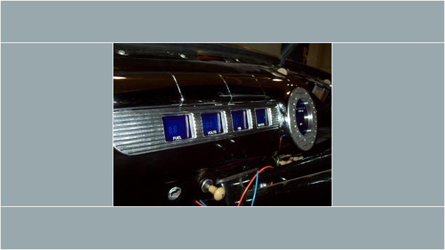Here's an alt tag for the image: Custom classic car dashboard gauges.