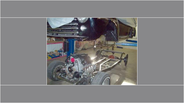 Here's a short alt tag for the image: Classic truck body over new chassis.