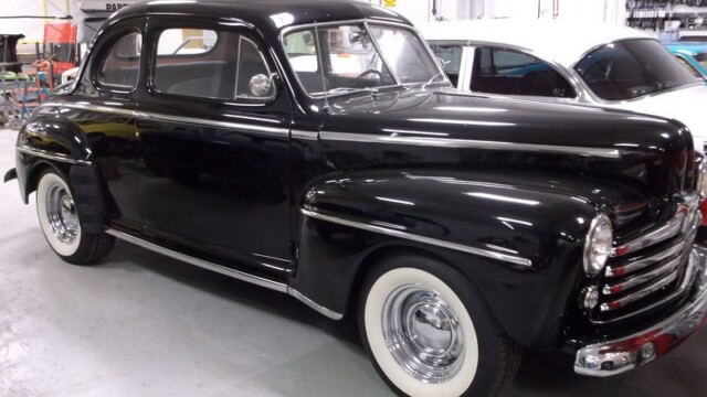 Black 1947 Ford Coupe classic car.