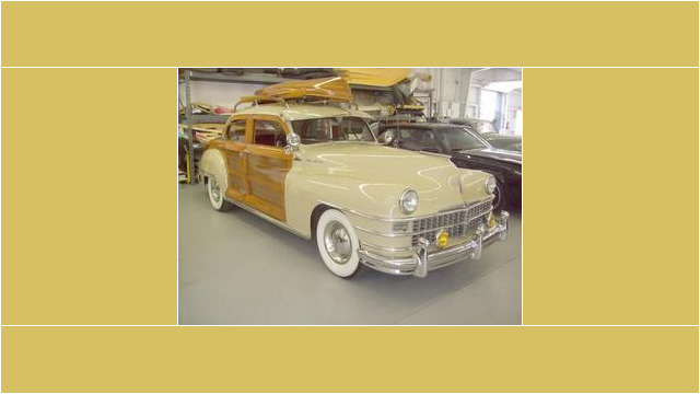 Here's an alt tag for the image: `Vintage Chrysler Town & Country Woody`