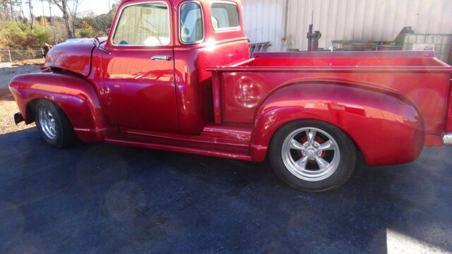 Red classic pickup truck, custom.