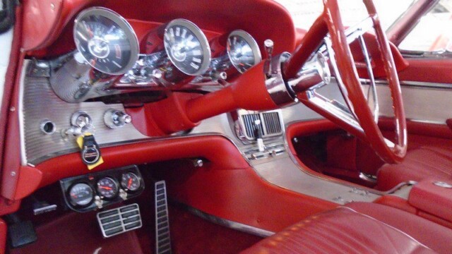 Red interior of a classic Thunderbird.