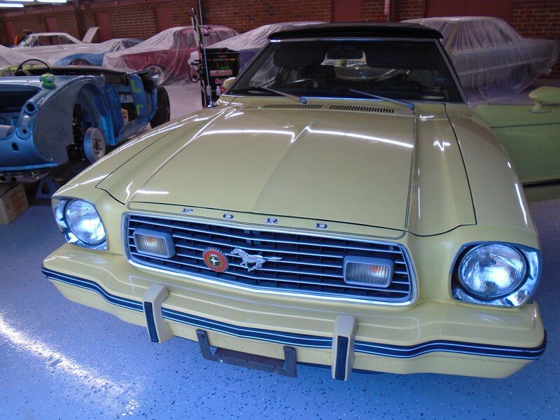 Cream color car on the display of the website