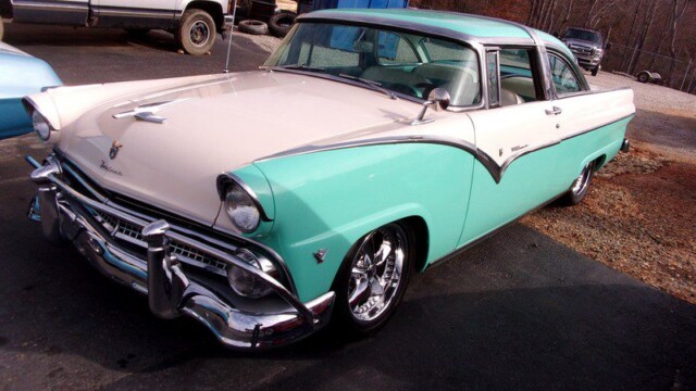 Vintage turquoise and cream Ford Fairlane.