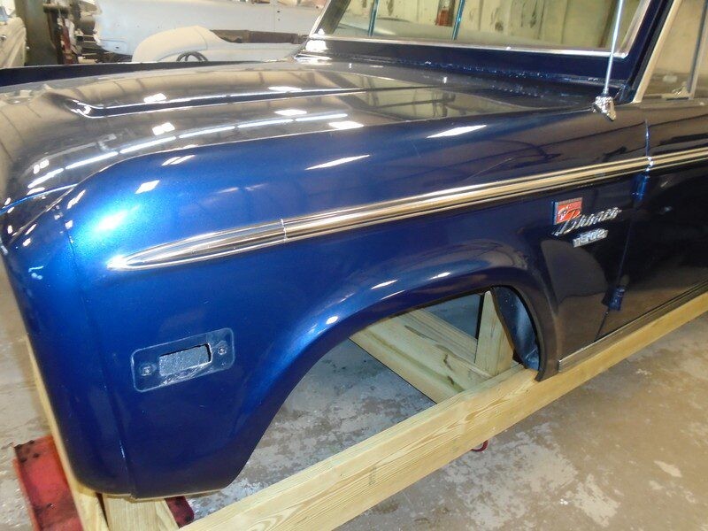 Dark blue classic Ford Bronco body.