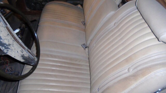 Beige car interior back seats.