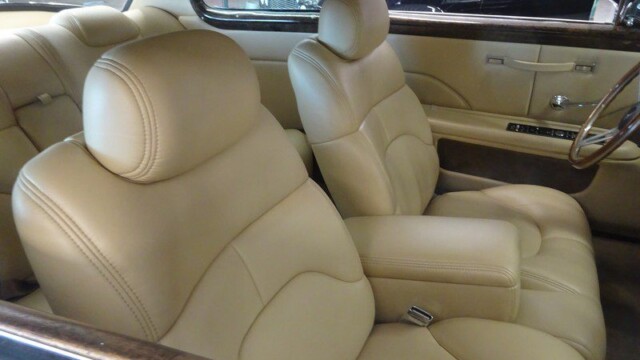 Beige leather car interior seats.
