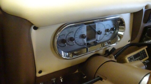 Custom car dashboard with gauges.