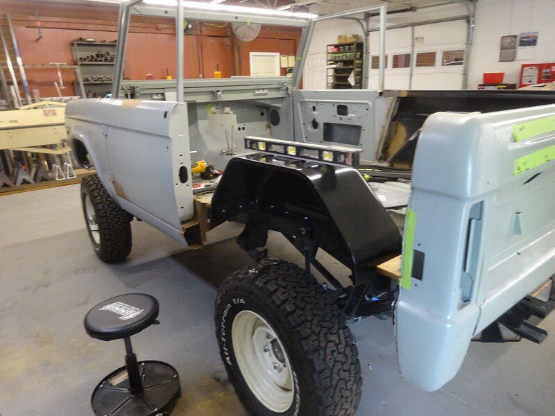 Gray Ford Bronco under restoration.