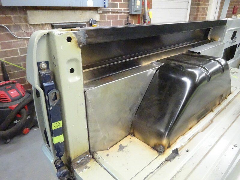 Car bodywork repair in progress.