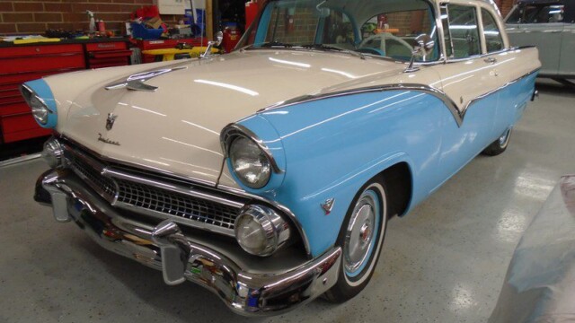 Vintage light blue and cream Ford Fairlane.