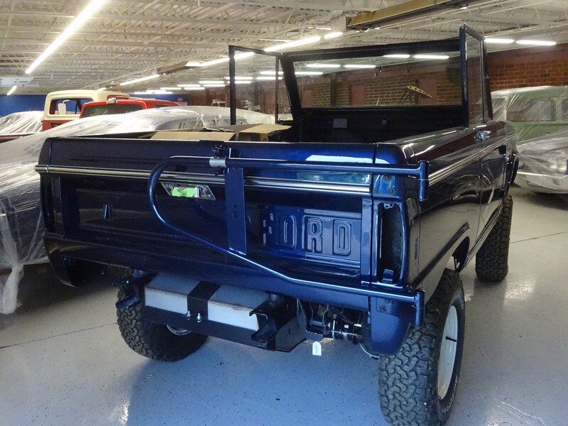 Dark blue Ford Bronco tailgate view