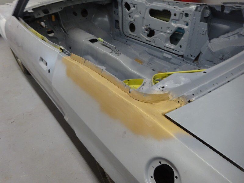 Passenger side primed shell with filler