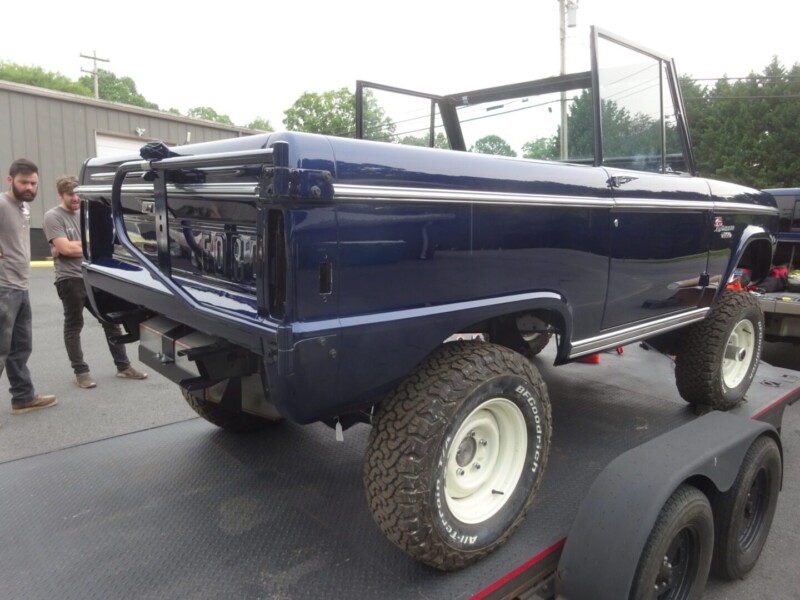 Restored Ford Bronco on trailer.