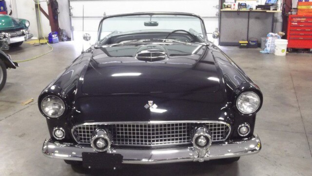Black 1955 Ford Thunderbird convertible.