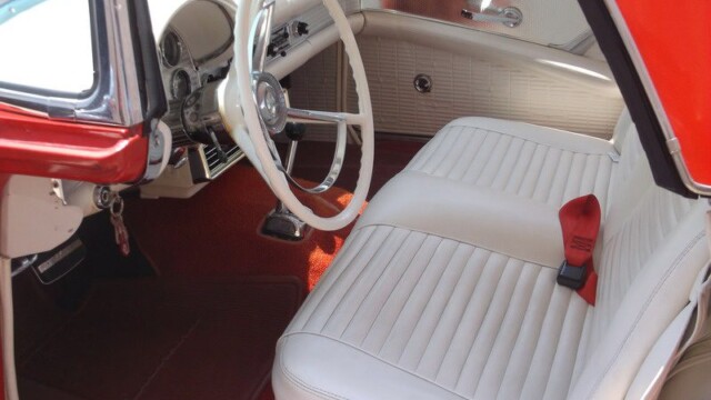 Red and white classic car interior.