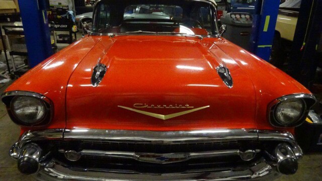 Red 1957 Chevrolet Bel Air convertible.