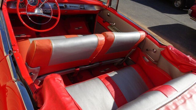 Red 1957 Chevy Bel Air convertible interior.