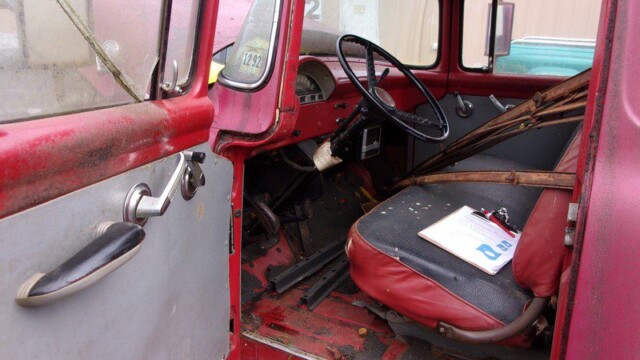 Red vintage truck cab interior.